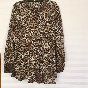 Leopard print blouse in brown, cream and tan.